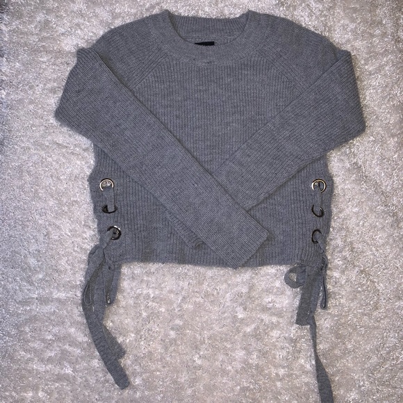 Grey cropped sweater with ties on the sides. - Picture 3 of 6